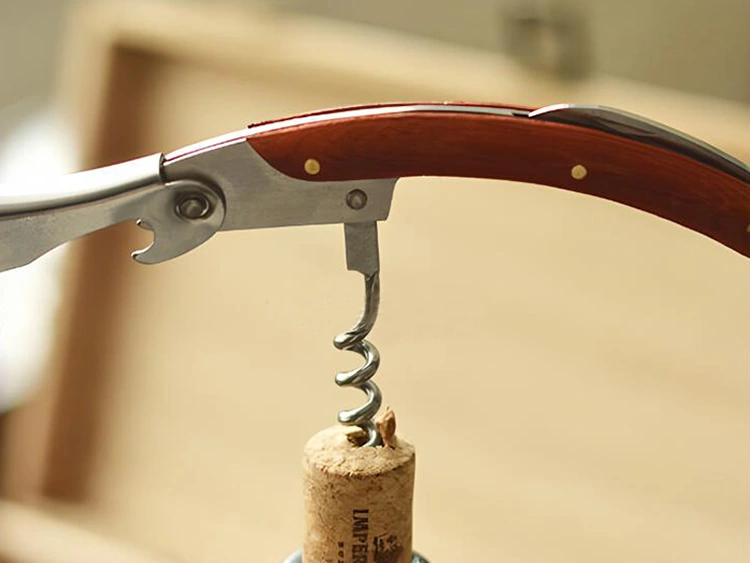 Usage method of wine knife bottle opener